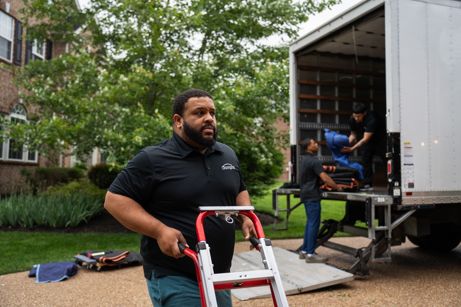 Professional movers loading truck